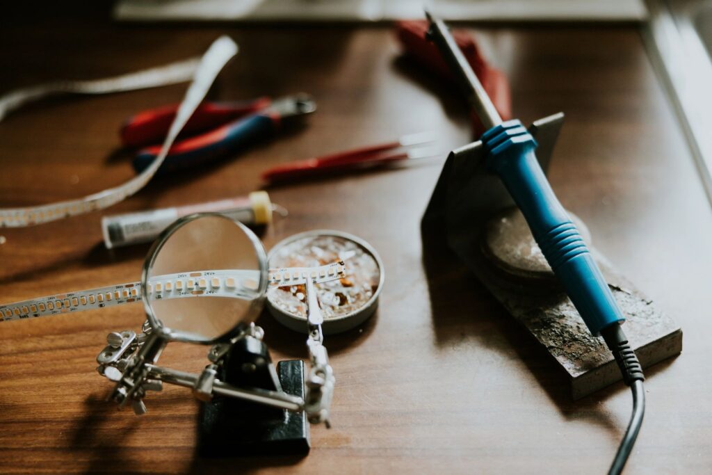 Electrician solders led light strip